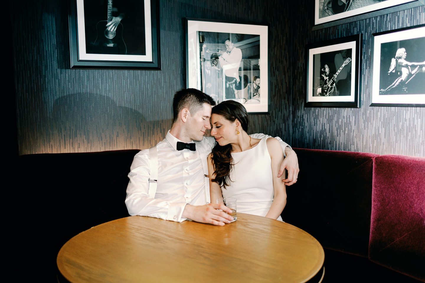 Intimate moment between bride and groom at wedding reception in Detroit, Michigan.